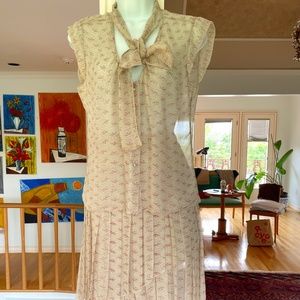 100% AUTHENTIC CHANEL see thew SILK SKIRT SET lined with logos size 38